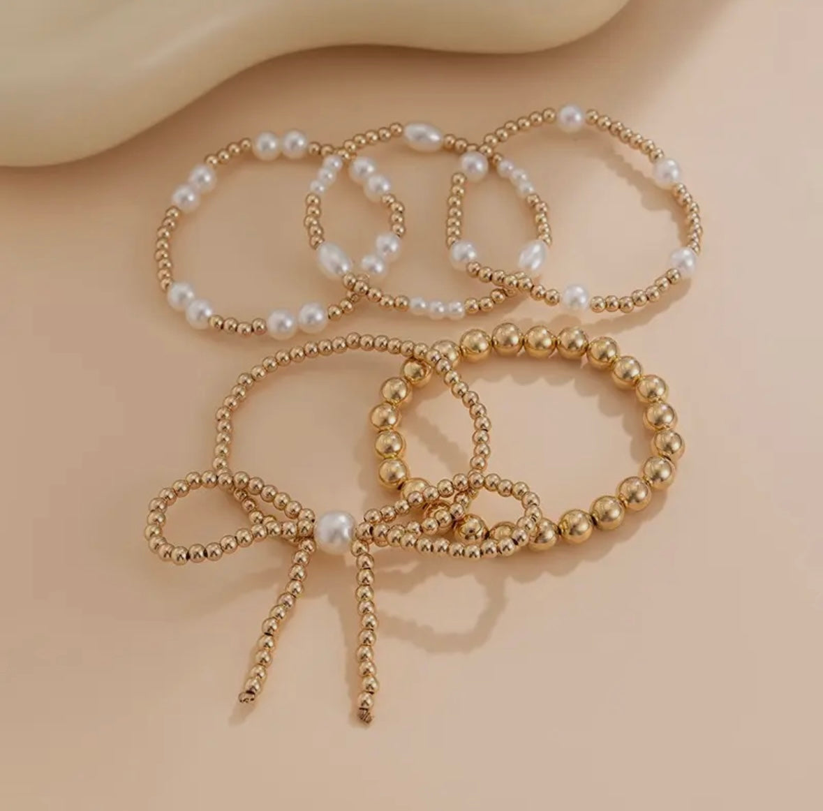 Gold Plated Pearl & Bow Bracelet Set