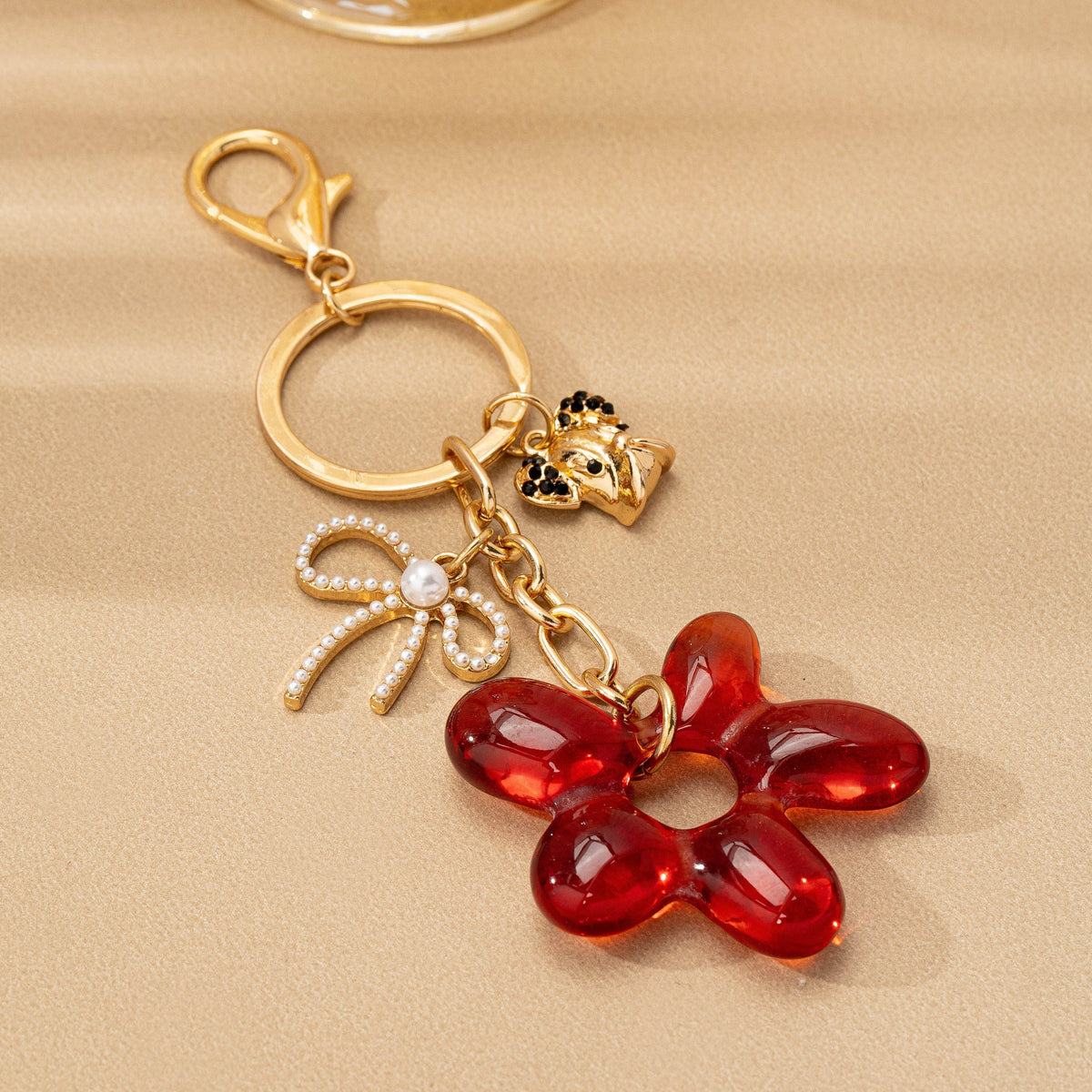 BAG CHARM KEY CHAIN-RESIN FLORAL BOW DOG